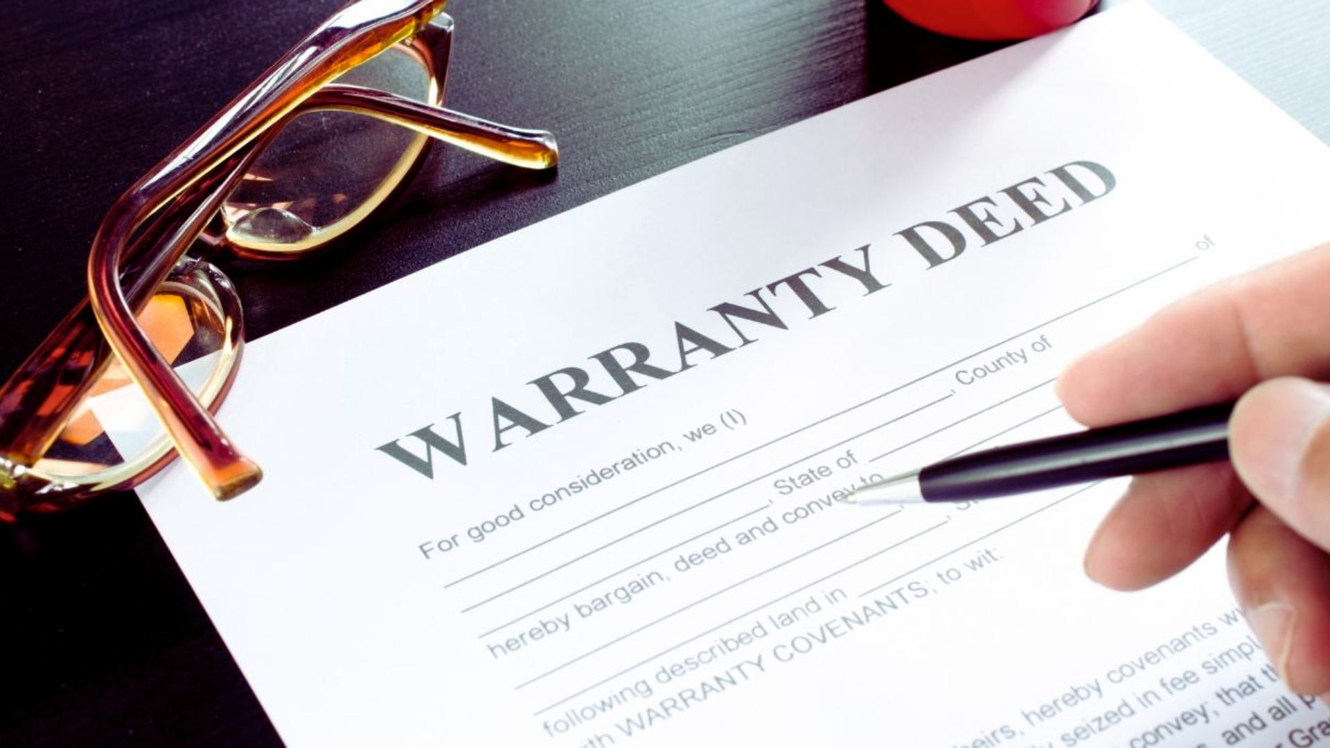 Warranty deed document for a car, detailing ownership transfer and terms of the agreement.