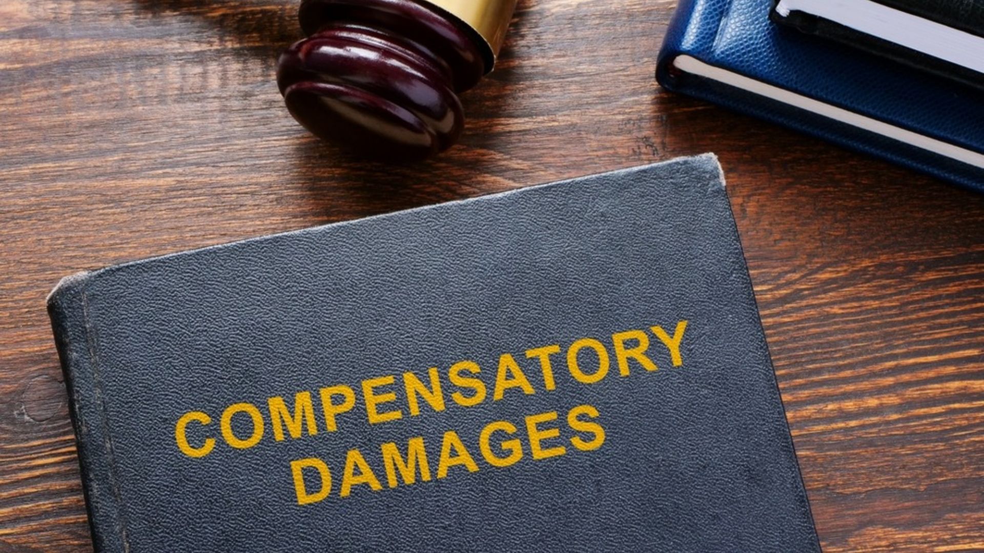 A gavel and legal documents symbolizing compensation for personal injury claims and legal proceedings.