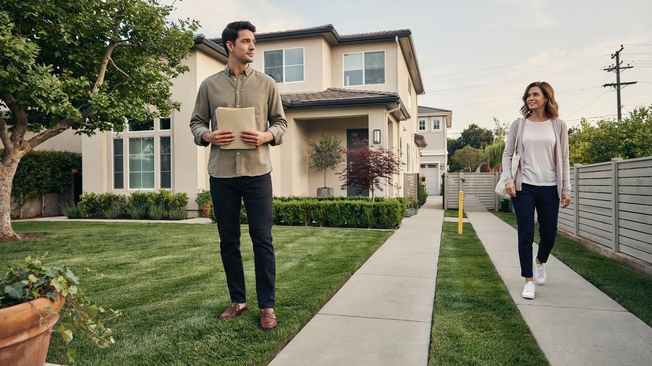 Homeowner beside a shared driveway with a neighbor using a legal easement.