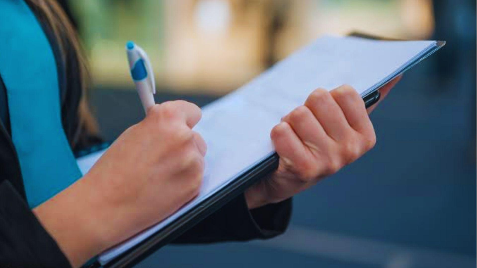 A Real Estate agent going through the checklist.