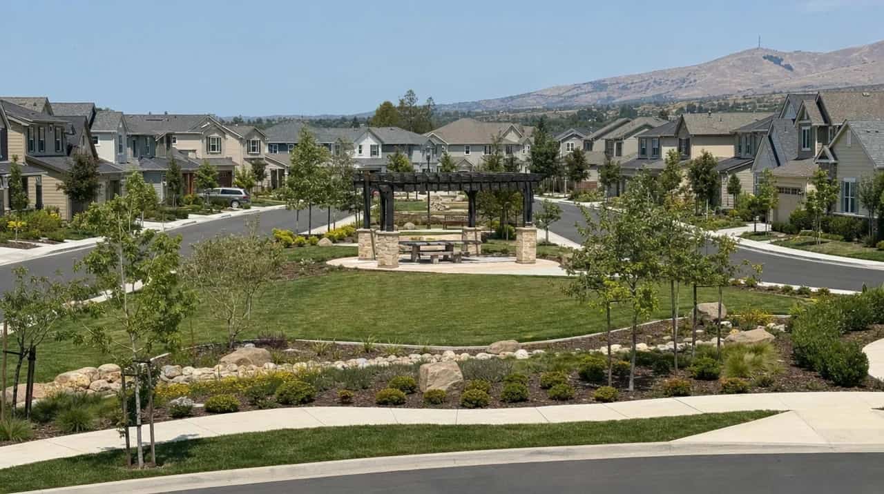 Planned residential community with consistent homes, landscaping, and shared spaces