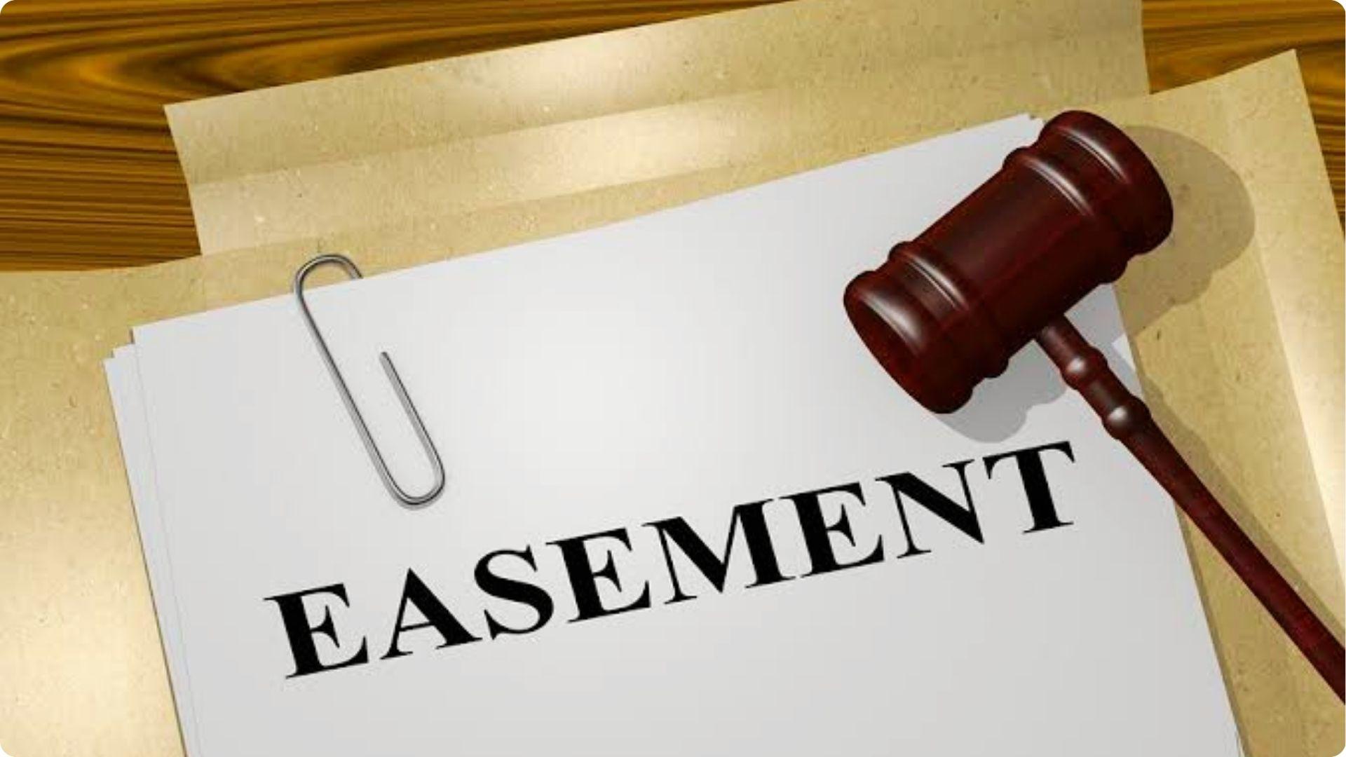 Legal paper labeled EASEMENT with gavel and clip showing property law for land access rights
